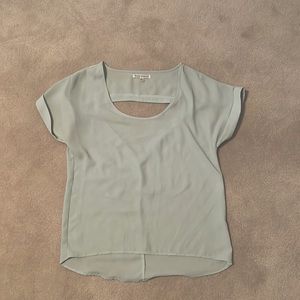 Anthropologie light blue/green shirt with back cutout